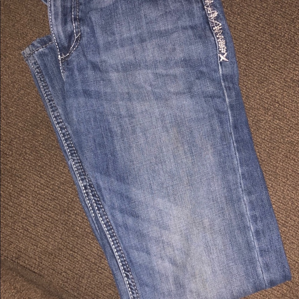 Youth size 14 wrangler 20x jeans.